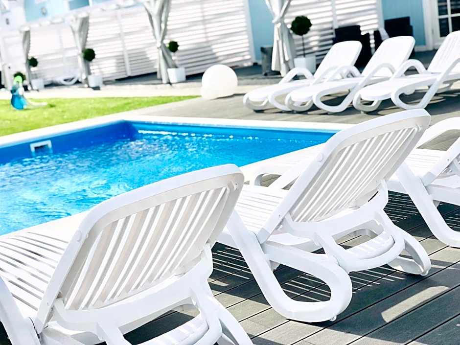 Domki BALTIC FAMILY basen kidsclub rowery