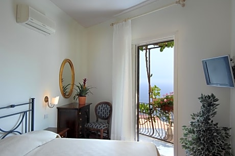 Superior Triple Room with Balcony and Sea View