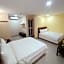 Capital O 90897 Island City Hotel