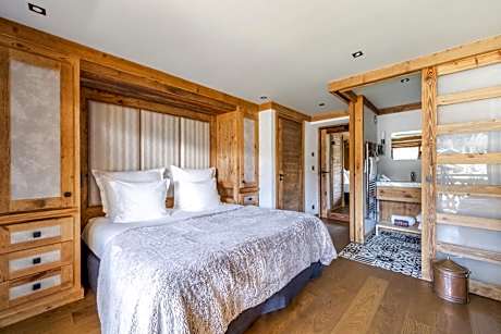 Comfort room with balcony and village view