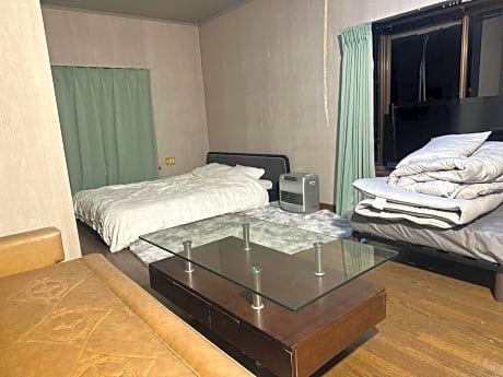 Economy Quadruple Room with Shared Bathroom