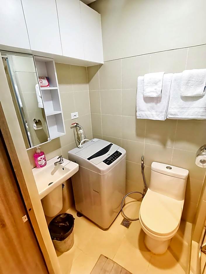 Stylish 1 Bedroom Condo Unit with Perfect Pool View Balcony at Fame Residences