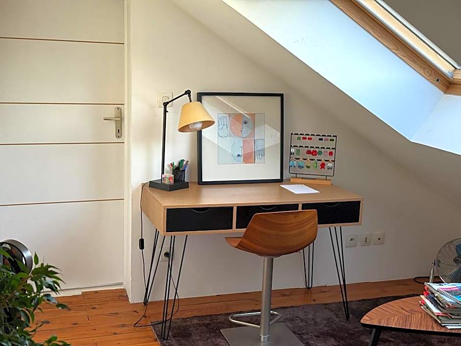 Chambre hôtes nichée sous les toits