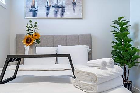 Stylish Getaway 2BD Basement by YMCA and South Health Campus Hospital