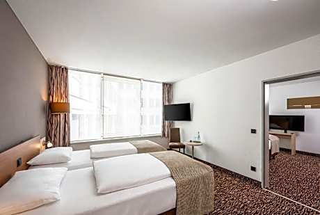 Two-Room Family Room with One Double and Two Single Beds