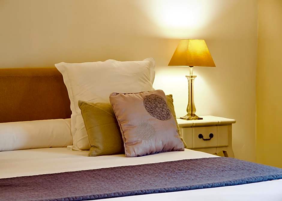 A Propos- Suites et chambres