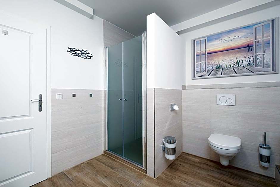 Gästehaus "Kleines Stadtidyll" -Zimmer und Apartments