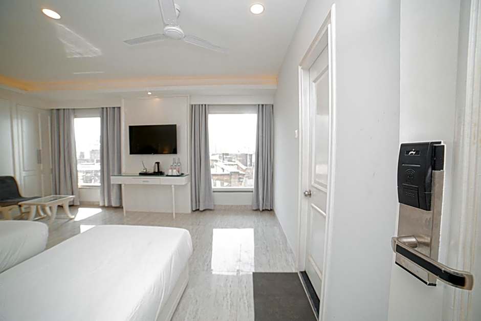 Photo 1 of 6 of Triple Room with 10% off on Two-way Airport/Railway/Bus Transfer and 20% Off on Laundry service for upto 2 clothing items