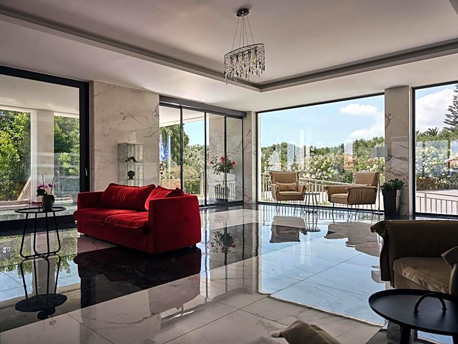 Cavo Orient Beach Hotel & Suites