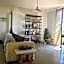 Departamento en planta baja con patio, dos habitaciones con dos ba¿os completos sala y cocina integral Vistas desde la azotea de