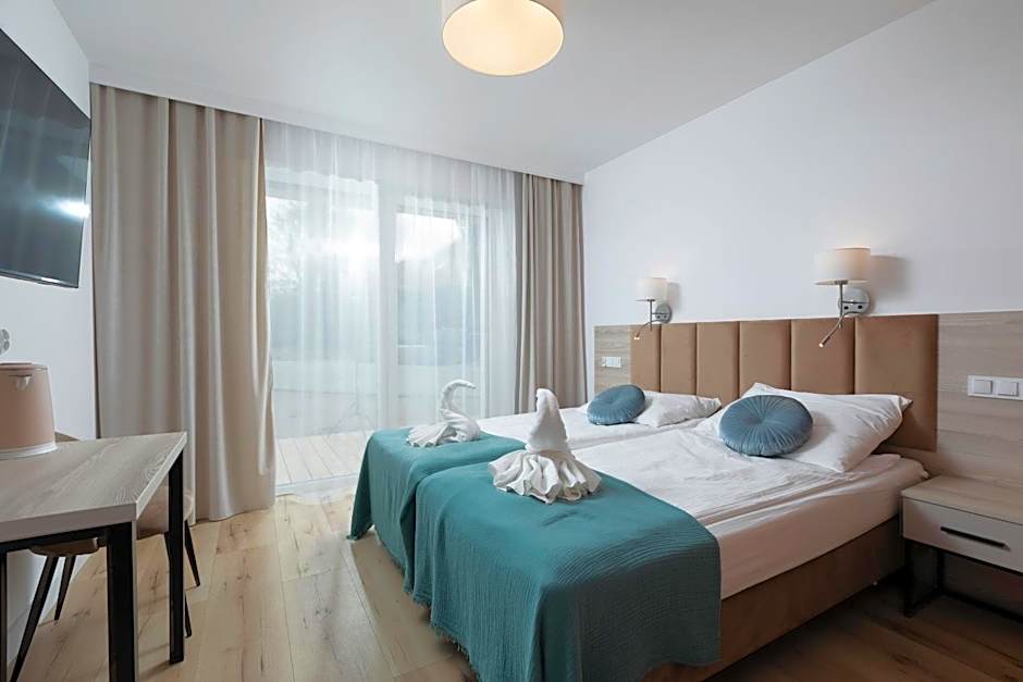 APARTAMENTY przy plaży z basenem z podgrzewaną wodą i mini SPA - Ośrodek Kolonijno-Wczasowy Mewa