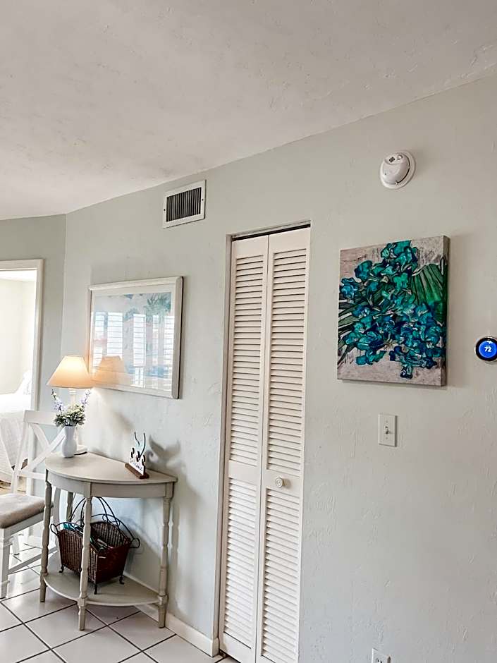 Knot a Care Remodeled Direct water access condo with ocean and pool views NOW SLEEPS SIX