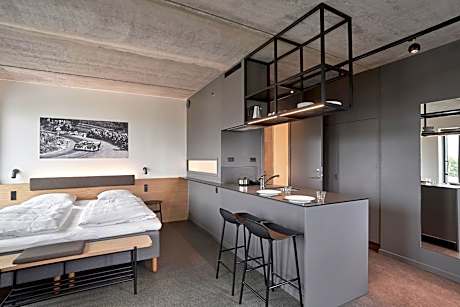 Larger Family Studio with One King and One Non-Private Sofa Bed