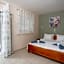 Geni Garden Apartments