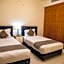 OYO 104 Q House 3 Apartments