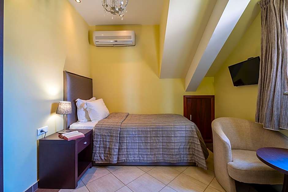 Meliton Inn Hotel & Suites by the beach