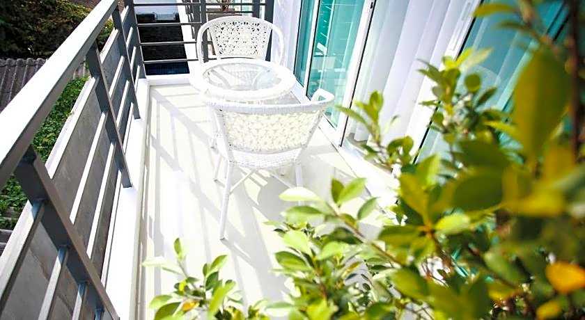 One World One Home Naiharn Hotel