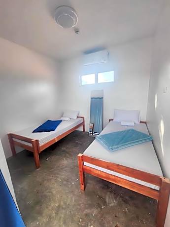 Twin Bed Private with Shared Bathroom