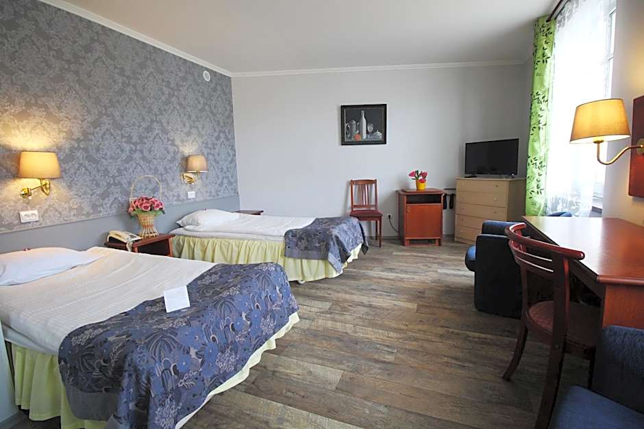 Photo 1 of 7 of Triple Room