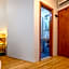 Yellow house with private parking