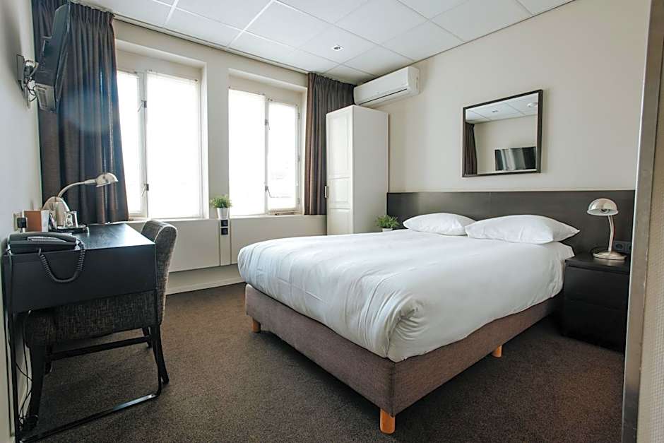 Foto 1 de 6 de Single Room