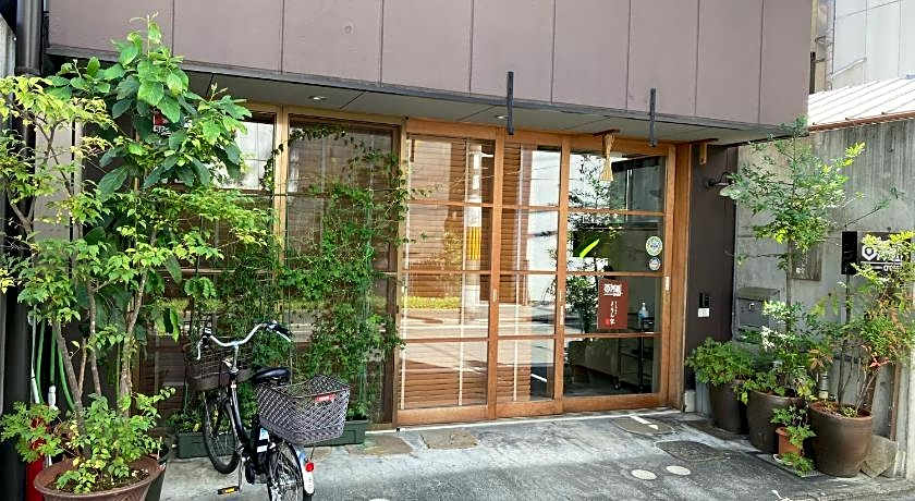 Guesthouse Hyakumanben Cross