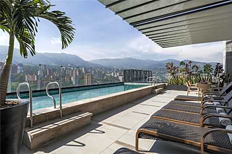 York Medellin, Curio Collection by Hilton