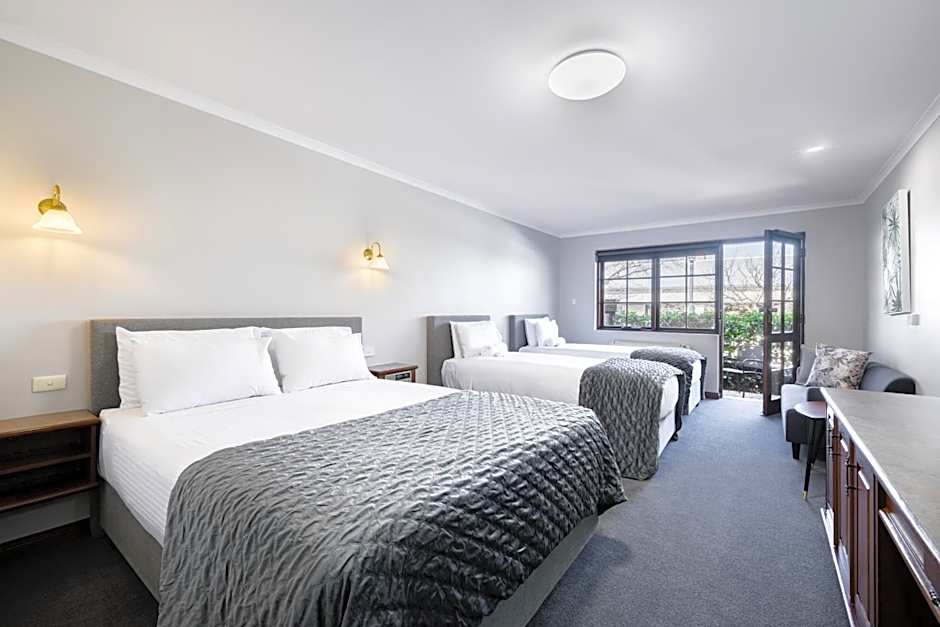 Photo 1 of 5 of Courtyard Deluxe 2 King Beds and 1 Queen Bed, Pet-Friendly