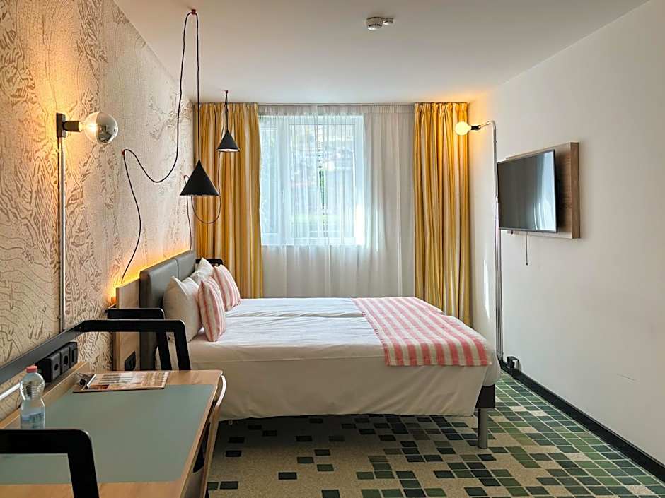 Nonanteneuf appart hōtel Sierre - contactless check-in