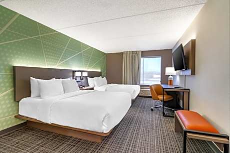 Efficiency Quadruple Room with Two Queen Beds and Roll-In Shower - Non Smoking