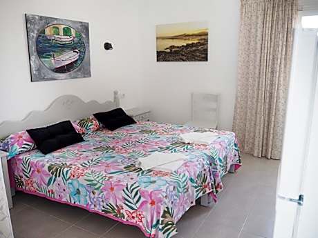 Triple Room with Balcony City Views