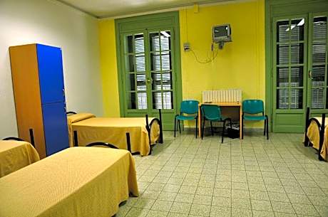 Single Bed in Six Bedroom Male Dormitory Room