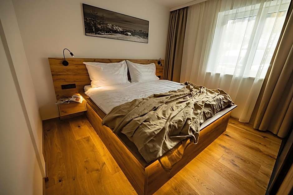 RIVERSIDE RAURIS APARTMENTS