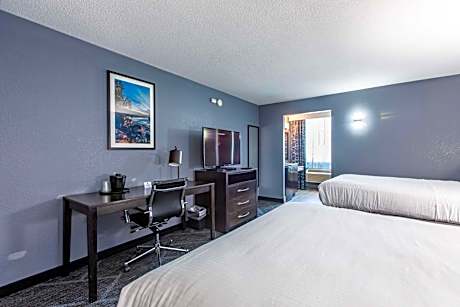 Queen Room with Two Queen Beds and Word Desk - Pool View