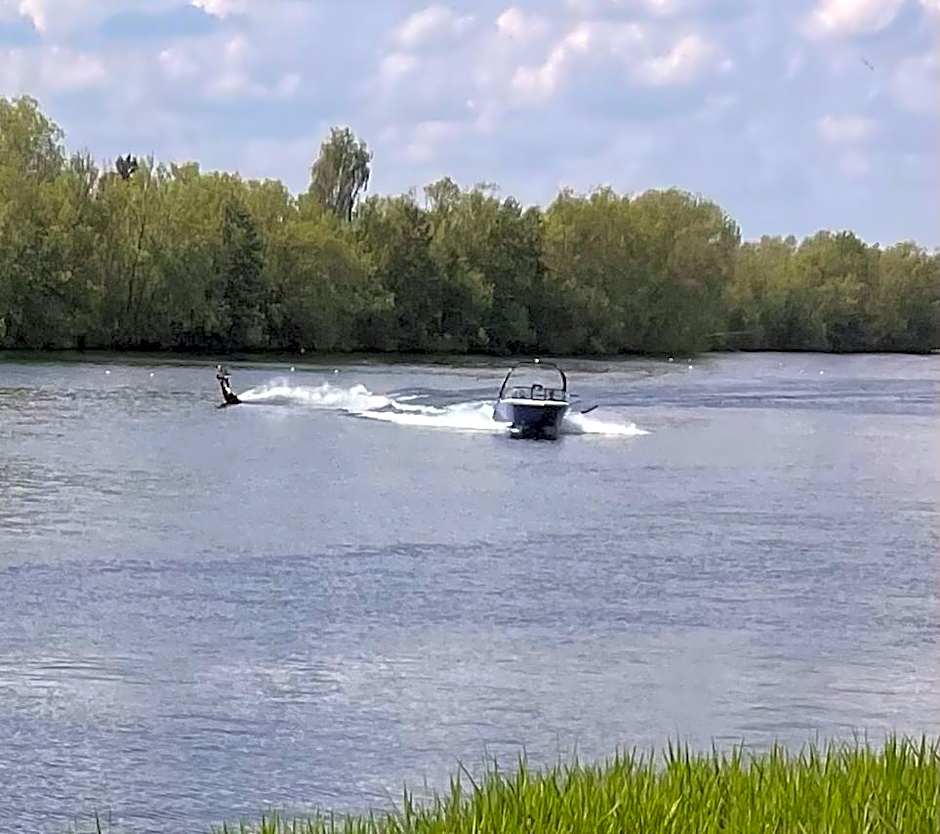 Award winning Serenity Lodge with outstanding lakeside views from the hot tub , at Tallington Lakes Leisure Park, Stamford