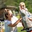 Aparthotel Familiaris - Family Apartments - Pools & Spa in Dolomites