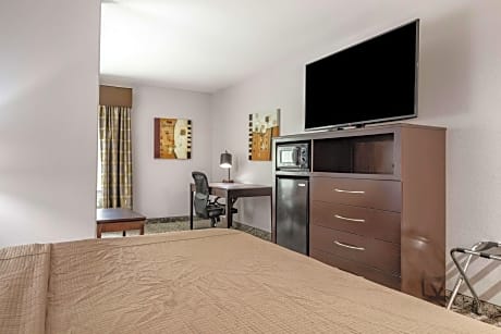 suite-1 king bed - non-smoking, 32-inch flat television, microwave and refrigerator, sofabed, continental breakfast