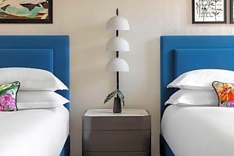 Essential Queen Room with Two Queen Beds and City View