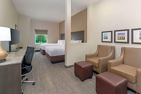 2 Queen Beds  Non-Smoking Flat Screen Television Two Chairs Ottoman Microwave And Refrigerator Haird
