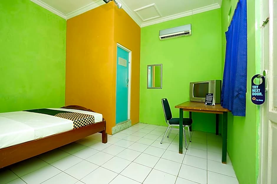 SPOT ON 2106 Homestay Flamboyan