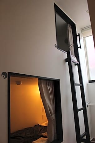 Single Bed in Dormitory Room