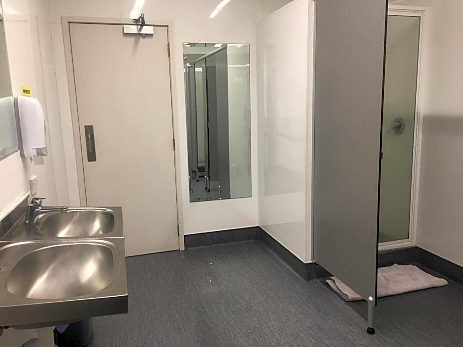 Surf 'N' Snow Backpackers Across Sky Tower