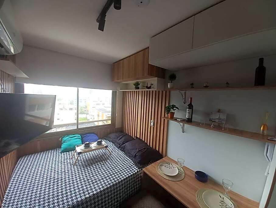 Studio aconchegante em frente a praia