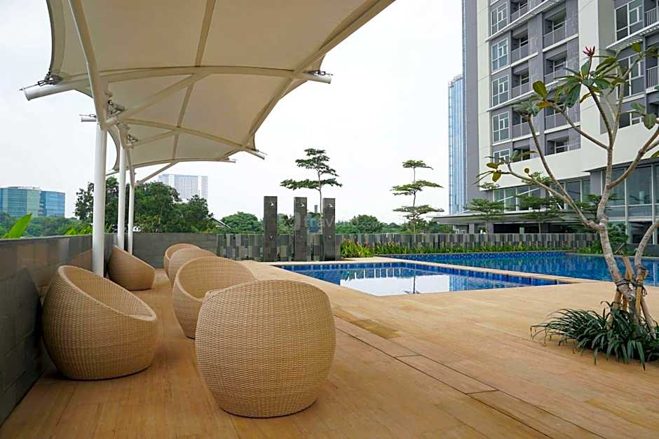 Well Design and Homey 1BR Ciputra International Apartment By Travelio