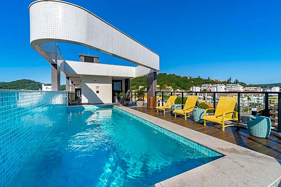 AION suítes 103 - Compacto e luxuoso Loft - Rooftop com piscina e academia - À poucos passos da praia