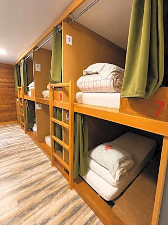 Single Bed in Dormitory Room