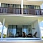 Escape to Paradise, Minimalist 4-BR Beachfront, 300 Mbps with amazing views
