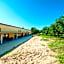 Lofts with private outdoor area and swimming-pool in Badesi