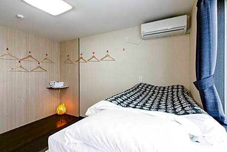 Economy Triple Room with Shared Bathroom