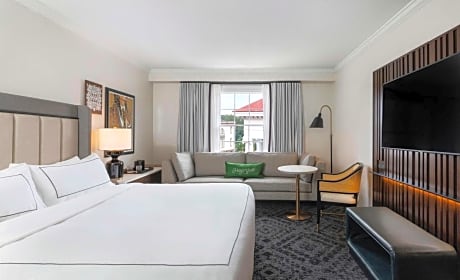 1 king bed - 32usd mandatory chg-lxry linen/bath amenities - 55 inch tv-keurig-comp wifi-in room safe -
